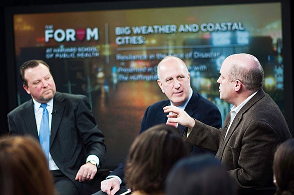 “I promise there will be surprises. No matter how well we prepare, there will be system failures," said Daniel Schrag (far right), director of the Harvard University Center for the Environment. Paul Biddinger (left) and Jerold Kayden were among the other panelists for the forum on "Big Weather and Coastal Cities" at the Harvard School of Public Health.