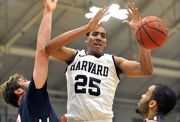 Kenyatta Smith '15 takes a shot at Friday's game. Smith established a new Harvard single-game record with 10 blocks, and finished with a career-best 20 points. 