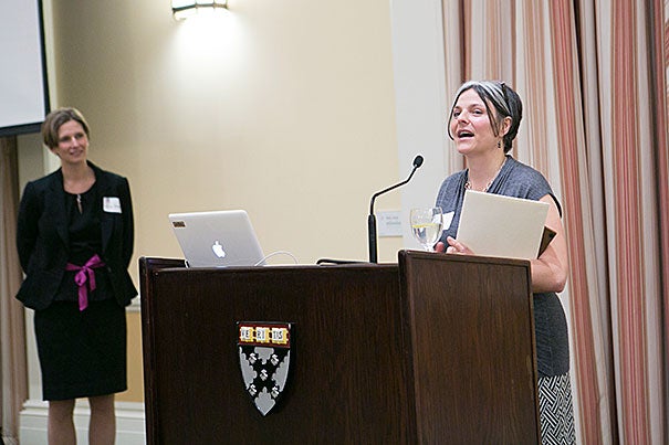 “When the [Gardner Pilot Academy] says they serve the whole child, the whole community, they do,” said Lisa Moellman (right) after receiving the Champion Award.  Gardner Principal Erica Herman (left) lauded Moellman's contributions during her tenure as Harvard's associate director of campus engagement and research in school. 