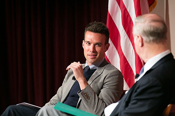 In a talk at the JFK Jr. Forum, Jon Favreau (left), the former director of speechwriting at the White House, told Professor David Gergen that as a speechwriter “your only goals are to clearly explain simple policies in as little words as possible, and then spend as much time as you can … inspiring people."