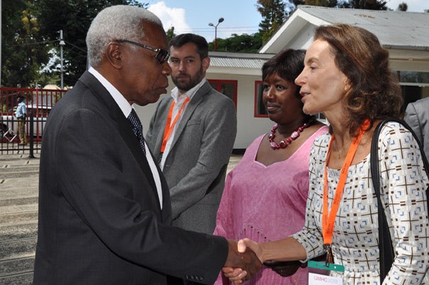 Tanzanian Vice President Mohamed Gharib Bilal greets Harvard School of Public Health's Ana Langer. Langer collaborated on a maternal health manifesto that was published in The Lancet on Feb. 22.