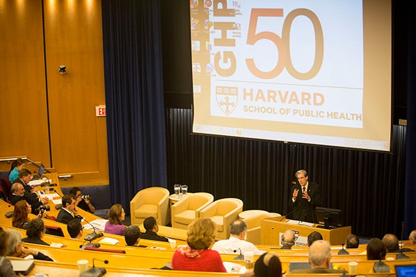 Harvard School of Public Health’s Department of Global Health and Population took time to appreciate 50 years of advances during a daylong symposium. HSPH Dean Julio Frenk (at podium), who gave the welcoming remarks, pointed out that anniversaries are important occasions on which to not only reflect on the past, but also refocus on the future. 