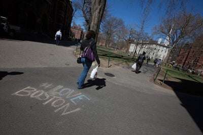 A Twitter hashtag — #LoveBoston — was written on the sidewalk in Harvard Yard. Members of the Harvard community later used the Twitter hashtag #virtualvisitas to reach out to incoming freshmen who had planned to attend Visitas, which was canceled due to the lockdown.