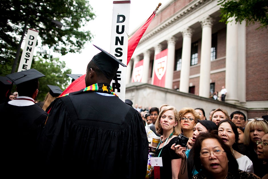 The Morning Exercises take place in Tercentenary Theatre. Family members watch graduates process in front of the steps of Widener Library during the Commencement ceremony of 2010. Stephanie Mitchell/Harvard Staff Photographer