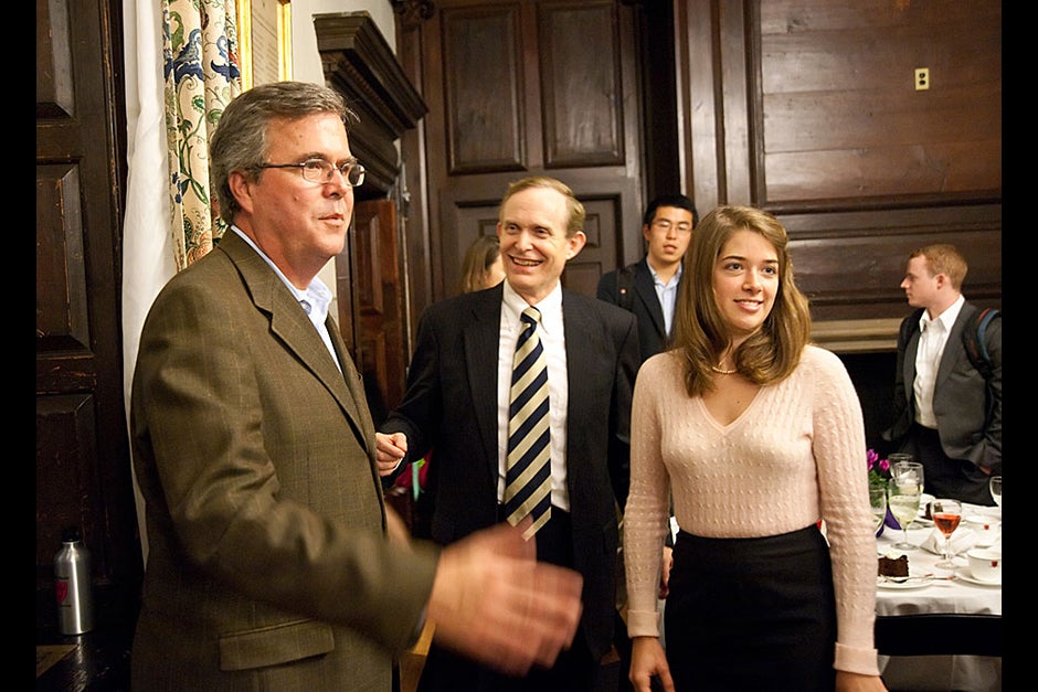 Former Florida Gov. Jeb Bush (left) greets students after a Dunster House dinner as House Master Roger Porter (center) looks on. Dinners like this one allow students to meet political and cultural figures in an intimate setting where they can ask questions and share ideas. Jon Chase/Harvard Staff Photographer
