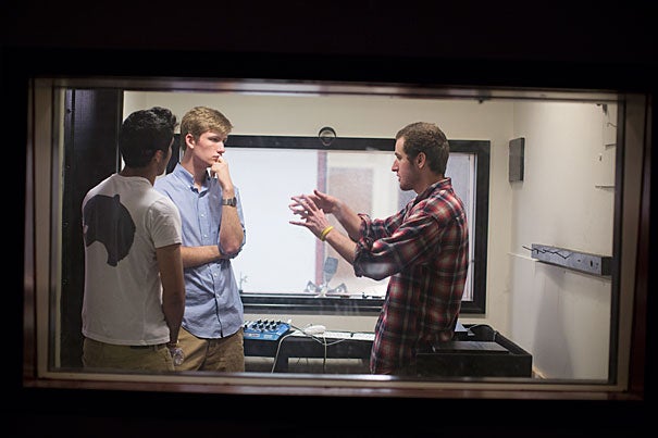 Rashad Hossain '16 (from left), Dylan Perese '16, and Matt Sheets '15 are involved with the fundraising and rebuilding of Quad Sound Studios in Holmes Hall, which closed years ago after a flood.