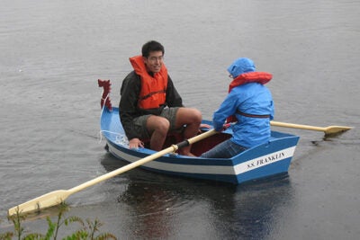 The Charles was the perfect place for Phillip Yao and Jessica Rucinski to test a boat they helped build as part of a project spearheaded by Professor Melissa Franklin.