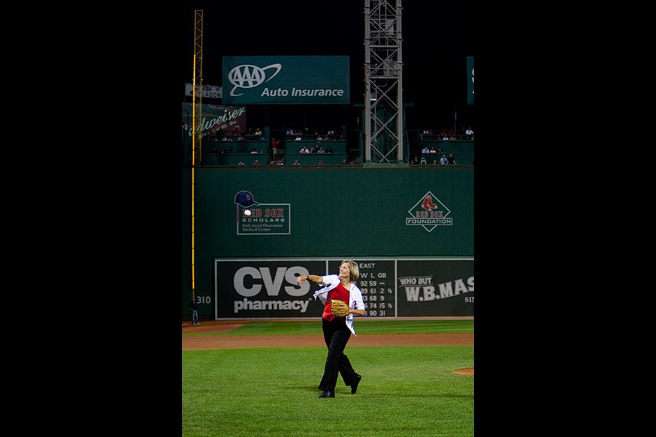 Hit me with your best shot! President Drew Faust lets one fly. Rose Lincoln/Harvard Staff Photographer
