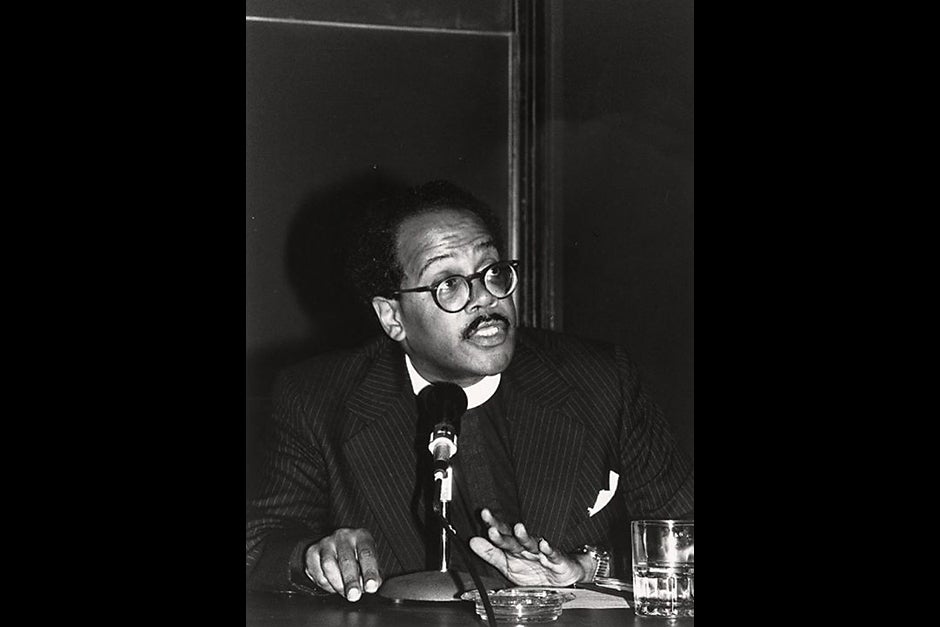 The Rev. Peter J. Gomes speaks at a Commencement symposium in 1982. Photo by Lilian Kemp/Courtesy of Schlesinger Library, Radcliffe Institute, Harvard University