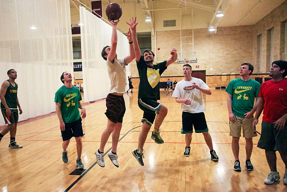 Team C members from Leverett House play basketball during an intrasquad game. Jon Chase/Harvard Staff Photographer