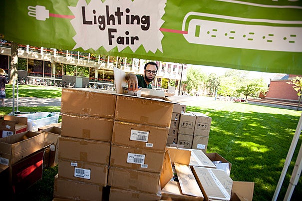 At Tuesday's Lighting Fair, faculty, students, and staffers like Research Associate in Computer Science Randy Pollack (photo 2) chose from a variety energy-saving devices, chalking up discounts of about 90 percent. 