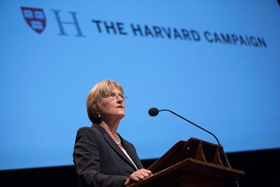 “For us, for this campaign, the real triumph will lie in our ability to rival the efforts and the commitment of those who have bequeathed this extraordinary institution to us, and to strengthen it for those who will follow,” said President Drew Faust at the launch of The Harvard Campaign on Saturday in Sanders Theatre (photo 1). Prior to Faust’s appearance, David M. Rubenstein (left), co-chair of the campaign, set the stage with a conversation with Bill Gates (photo 2). Earlier in the day (photo 3), "The Future of Knowledge" was explored by moderator Jonathan Zittrain (from left) and professors Rebecca Henderson and Peter Sorger, among others.