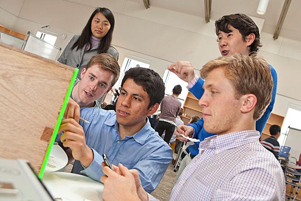 Team-based design projects feature prominently in AP 50. Aaron Perez '15 (center) and his teammates (photo 1) solve a series of riddles to break into a safe designed by another team of students in Professor Eric Mazur's class  (photo 2). Joy Hui '16 and Perez use a pan pipe to prove their point (photo 3).