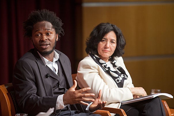 Ishmael Beah, a former child soldier in Sierra Leone and the author of “A Long Way Home: Memoirs of a Boy Soldier” spoke with Leila Zerrougui (right), the U.N.’s special representative of the secretary-general for children and armed conflict at the Harvard Kennedy School’s JFK Jr. Forum on Monday.