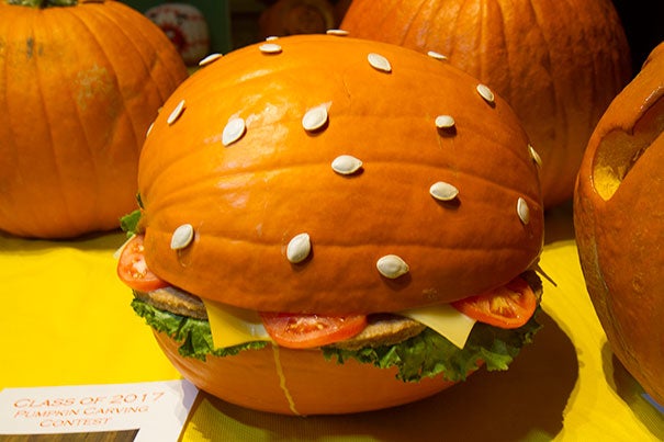 Wigglesworth D served up  “Annenburger,” which won the award for "Most Creative" in the annual pumpkin-carving contest (photo 1). Pennypacker gave a nod to the Red Sox with “David Gourditz a.k.a. Big Pumpi” (photo 2), while Stoughton North's Yale-eating pumpkin garnered its designers the "Most Harvard" award (photo 3).