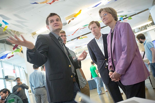 Finalists from the 2013 challenge have set a high bar for those ready to participate in the 2014 President's Challenge. In May, Scott Crouch '13 (from left) and Florian Mayr '13 demonstrated their project, Nucleik, for Gordon Jones, managing director of the i-lab, and  President Drew Faust. Nucleik, now known as Mark43, has raised almost $2 million in funding.