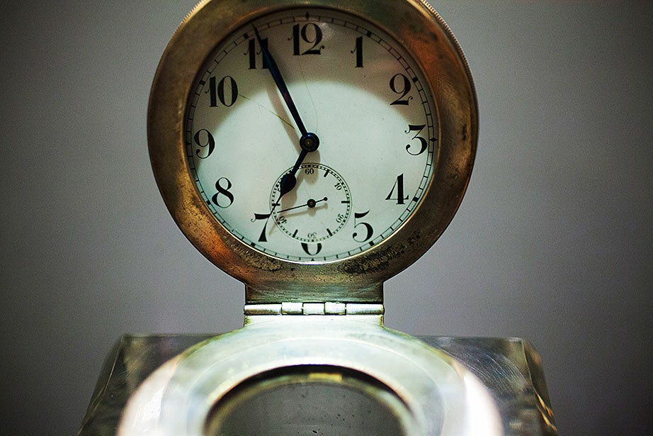 The removable pocket watch on a crystal inkwell owned by Harry Elkins Widener. (MS HEW 5, Houghton Library, Harvard University)