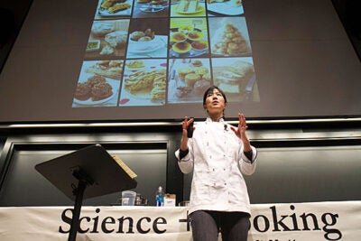 Before a packed house, Joanne Chang '91 (photo 1) demonstrated a simple baking technique with caramelized sugar, creating a spun-sugar net on a tower of cream puffs, known as croquembouche (photo 2, 3). 