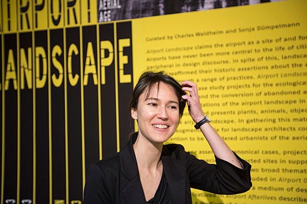 “The airport itself is this nice nucleus that can act as a container of broader ideas,” said Sonja Duempelmann (photo 1), who helped organize “Airport Landscape: Urban Ecologies in the Aerial Age” at Gund Hall this week. An exhibit of the same name is also on view through Dec. 19. Its color scheme, signage, and scale are all echoes of modern airports. It is the first time, organizers said, that every display space in Gund Hall has been given over to a single theme (photos 2 and 3.