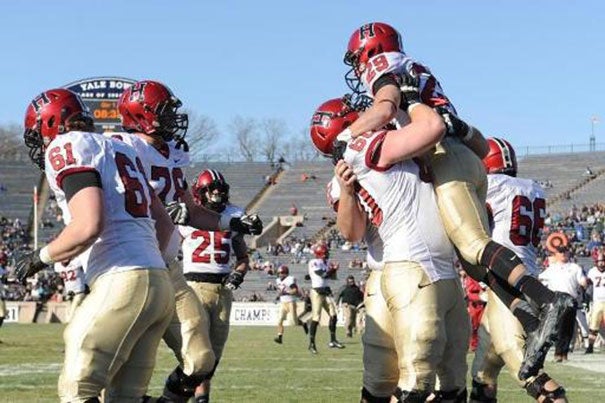 Paul Stanton and the Crimson earned a share of the Ivy League title with a 34-7 battering of Yale Saturday.