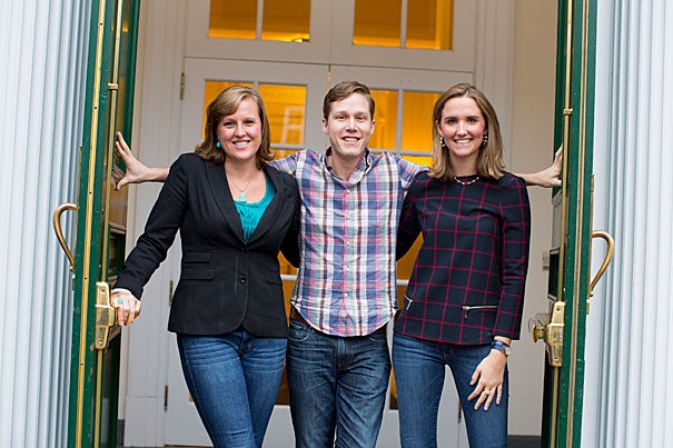 Harvard Business School students Amanda Burlison (left) and Alexandra Daum are co-presidents of the Women's Student Association, which has now begun including male members, known as "manbassadors," like Daniel Samit (center). “One of our goals is absolutely to give an outlet to men who are passionate and interested in getting involved,” said Burlison. 