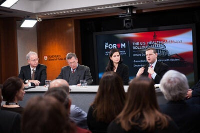 John McDonough (from left), professor of the practice of public health; Robert Blendon, the Richard L. Menschel Professor of Public Health; Katherine Baicker, professor of health economics; and Otto Eckstein Professor of Applied Economics David Cutler participated in “The U.S. Healthcare Law Rollout: Where Do We Stand?” 