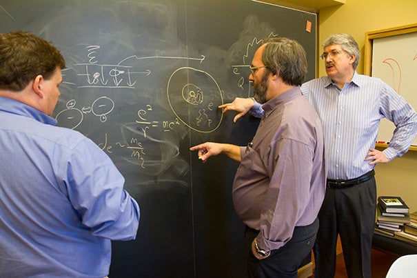 Yale's David DeMille (from left), and Harvard professors Gerald Gabrielse and John Doyle are known as the ACME team. Together, the researchers recorded the most sensitive measurements to date of electron deformation. 