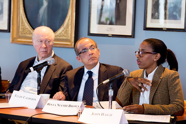 Among the panelists at a Harvard Kennedy School discussion on events at the World Economic Forum in Davos, Switzerland, were David Gergen (from left), Felipe Calderón, former president of Mexico, and Binta Niambi Brown. Brown, a senior fellow at the Mossavar-Rahmani Center for Business and Government, attended her first Davos event as part of the forum’s Young Global Leaders program. 