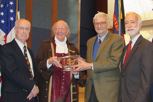 Harvard's E.O. Wilson (third from left) received the Benjamin Franklin Founder Award from "Benjamin Franklin." Also at the ceremony were Douglas W. Tallamy, chair of the Department of Entomology and Wildlife Ecology at the University of Delaware (far left) and Robert McCracken Peck, senior fellow, Academy of Natural Sciences of Drexel University (far right).