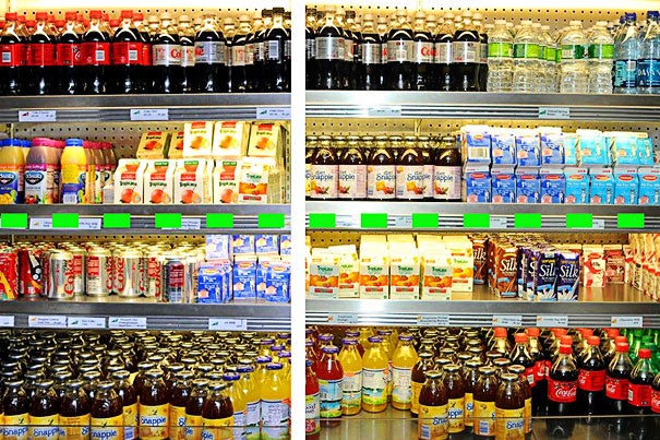 Before MGH changed its cafeteria to conform to  "traffic light" labels and product placement, sugar-sweetened soft drinks and juices were mixed together with diet beverages and low-fat dairy items (left). After the implementation (right), water, diet beverages, and other healthy choices are now placed at or above eye level (dotted line), while less healthy items are below.