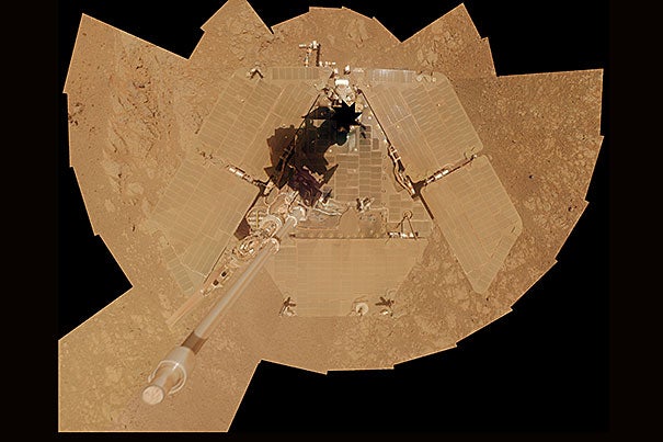 NASA's Mars exploration rover Opportunity recorded the component images for this self-portrait about three weeks before completing a decade of work on Mars (photo 1). Researchers used Opportunity to find a water-related mineral on the ground that had been detected from orbit. The mineral was located in the dark veneer of rocks on the rim of a crater named Endeavour. The brushed area is about 1.5 inches wide (photo 2).