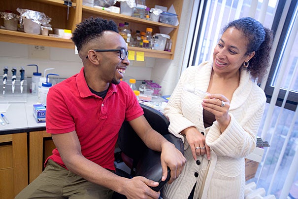 Grad student Delbert André Green II (left) and Associate Professor Cassandra Extavour have been able to show how phenotypic plasticity may be connected to evolution in a single mechanism — insulin signaling in fruit flies. “This is the first example, to my knowledge, that shows this link — between heritability and plasticity — being controlled by the same mechanism,” Extavour said.
