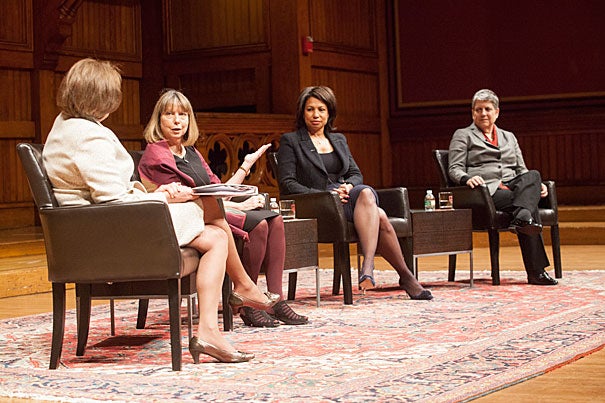 At Sanders Theatre, a panel of top female leaders examined the evolving role of women. Karen Gordon Mills (from left, photo 1) posed questions to Jill Abramson, Edith Cooper, and Janet Napolitano, following an introduction by Harvard University President Drew Faust (photo 2). Faust called the gathering a “critical conversation” about the challenges and opportunities women face today.
“What does power require of me beyond a thick skin?” she asked.