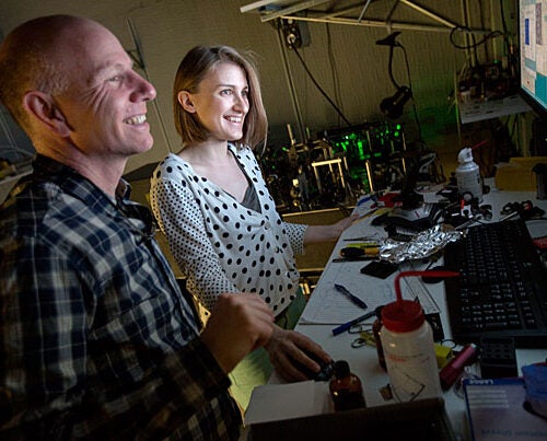 Professor of Physics and of Applied Physics Amir Yacoby (left, photo 1) and physics research assistant Yuliya Dovzhenko work in the lab where Yacoby (photo 2) and his colleagues have developed an MRI system that can produce nanoscale images.