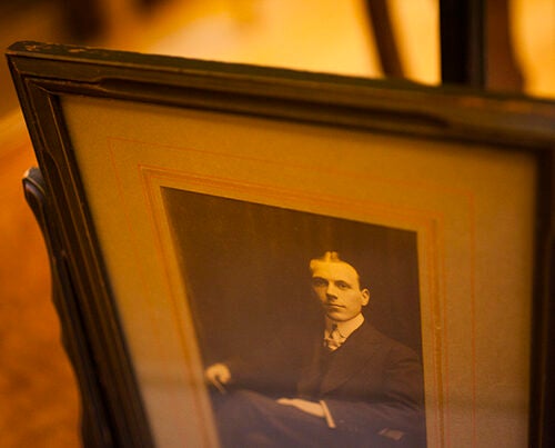 The Harry Elkins Widener Memorial Collection resides inside Widener Library at Harvard University. A photograph of Harry Elkins Widener is on display in the room. Stephanie Mitchell/Harvard Staff Photographer