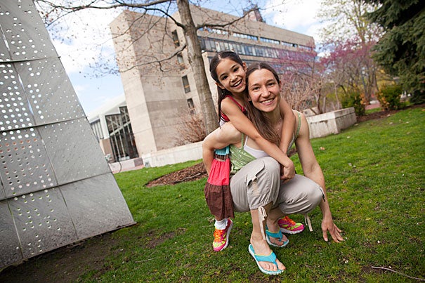 Natalia Gaerlan, pictured here with 9-year-old daughter Malaya, is a landscape architect who became intrigued by coastal cities in developing countries that will be hardest hit by the consequences of climate change. She arrived at Harvard in the fall of 2012, and three dramatic events marked her first year: Hurricane Sandy, winter storm Nemo, and the Boston Marathon bombings. 