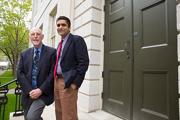 Both Donald Pfister (left) and Rakesh Khurana believe strongly that an important role for the dean is to foster and build the College community of learning. “My goals were modest in a way, but they were really about reaching out and connecting with the students, and working within the College to make sure we weren’t merely in a transition, but moving the College forward,” said Pfister, who now turns the reins over to Khurana.