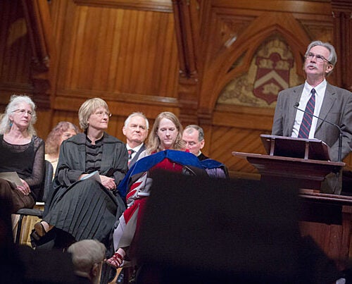 For the 224th Phi Beta Kappa Literary Exercises, President Drew Faust (center) hosted novelist and short story writer Andrea Barrett (left) and poet, translator, and critic Donald Revell (at podium), who read from his collection “Pennyweight Windows.”