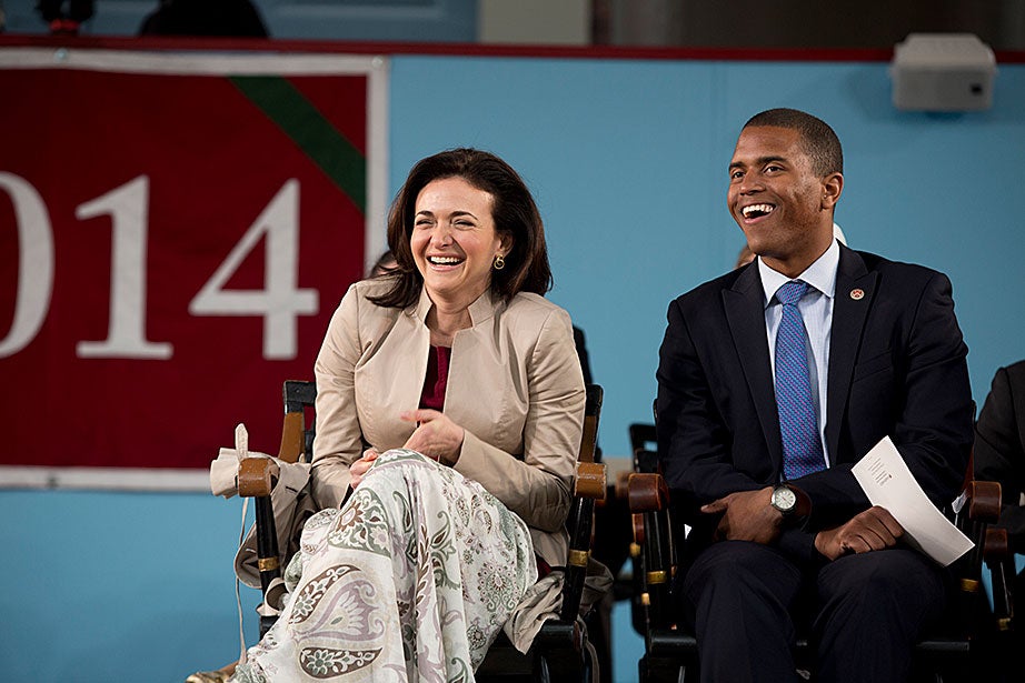 Facebook COO Sheryl Sandberg shared an onstage laugh during Class Day, where she was the featured speaker. Rose Lincoln/Harvard Staff Photographer