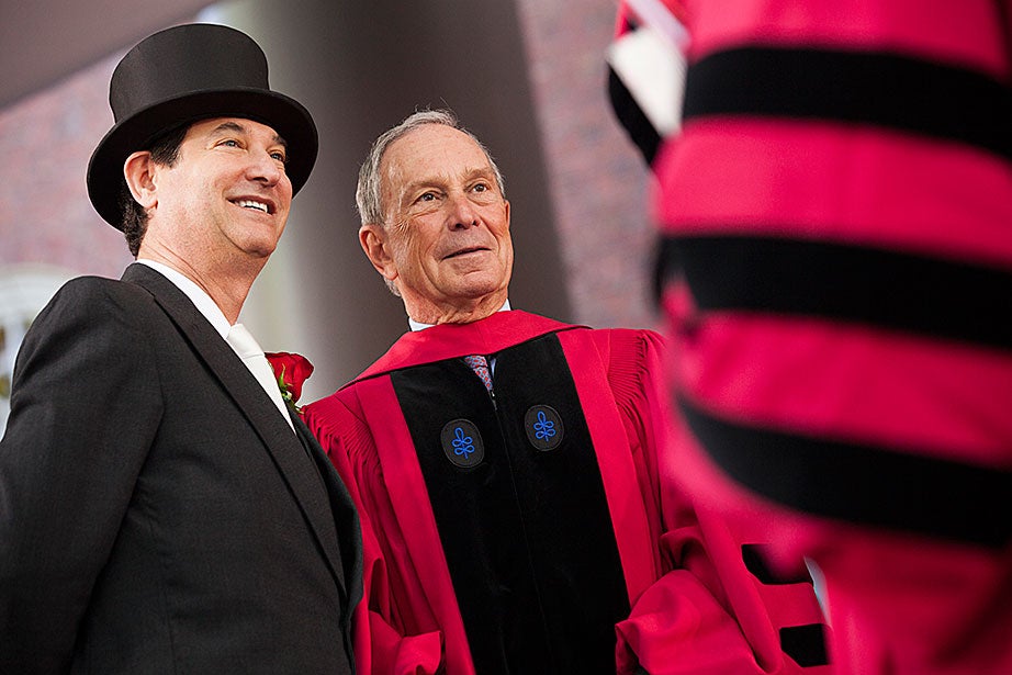 Harvard Corporation member James Breyer (left) and Commencement speaker Michael Bloomberg onstage. Stephanie Mitchell/Harvard Staff Photographer