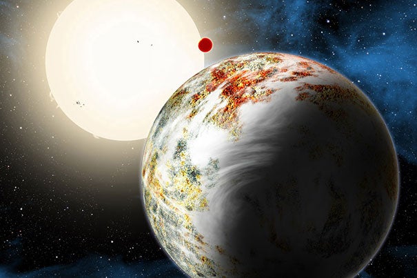 The newly discovered “mega-Earth” Kepler-10c dominates the foreground in this artist’s conception. Its sibling, the "lava world" Kepler-10b, is in the background. 