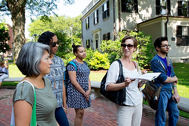 Harvard Summer School instructor Christina Hodge (in sunglasses) leads students Teresa D'Onfro (from left), Jordan Kijewski, Horizon Starwood, and Tom Somi on a tour of Harvard's hidden treasures.