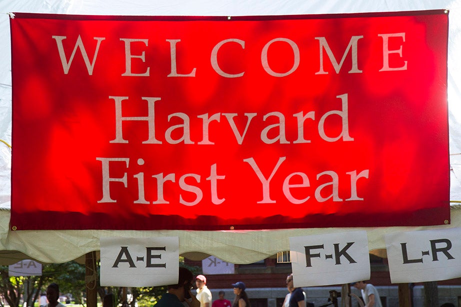 Freshmen receive a big welcome in Harvard Yard on move-in day. Jon Chase/Harvard Staff Photographer