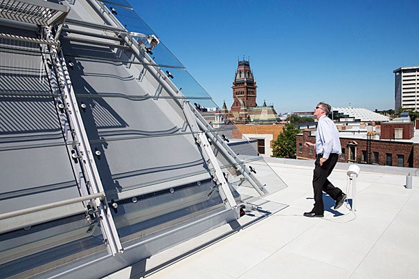 Director of Facilities Planning and Management for the Harvard Art Museums Peter Atkinson examines the Harvard Art Museums’ new rooftop designed by Italian architect Renzo Piano (photo 1). The elegant glass and steel roof (photos 2, 3) diffuses sunlight into the building’s new central circulation corridor including various galleries and arcades, and onto the iconic Calderwood Courtyard. 