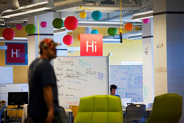 An overview of the Harvard Innovation Lab (i-lab) shows Phil Strazzulla from LifeGuides.me busy at work on his platform, which helps millennials navigate challenging life events. 
