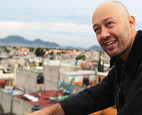 Mexico City architect Jose Castillo, M.Arch. ’95, D.Des. ’00, on the rooftop of an affordable housing complex that his firm designed. Building in a megacity of 21 million, he said, is always “a struggle towards equity.”  