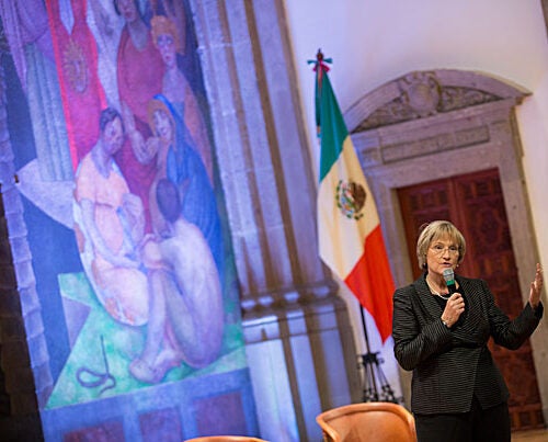 “The research interests that spark connections between Harvard and Mexico are extraordinarily varied — from archaeology to the arts, from education to public health, to economics, politics, [and] public policy,” said Harvard President Drew Faust (photo 1), who later answered questions at the Your Harvard event in Mexico City's Colegio de San Ildefonso. Jorge Dominguez (from left, photo 2) led a panel discussion with Mary Schneider Enriquez, Alejandro Ramírez Magaña, Laura Alfaro, and Julio Frenk before a packed audience (photo 3) also during Tuesday's event.