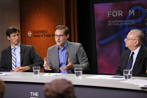 Panelists at HSPH on Thursday included Professor of Medicine and of Global Health and Population Michael VanRooyen (left), Ebola researcher Stephen Gire, and former Harvard School of Public Health Dean Barry Bloom.