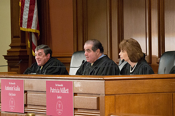 The presiding judges for Harvard Law School's Ames Moot Court Competition were Judge Adalberto Jordan of the U.S. Court of Appeals for the 11th Circuit (from left), U.S. Supreme Court Associate Justice Antonin Scalia, and Judge Patricia Millett of the U.S. Court of Appeals for the District of Columbia Circuit. Following the students' deliberations, Scalia said, “This is as good an argument as you are likely to hear in a court of appeals, and probably in my court.” 
