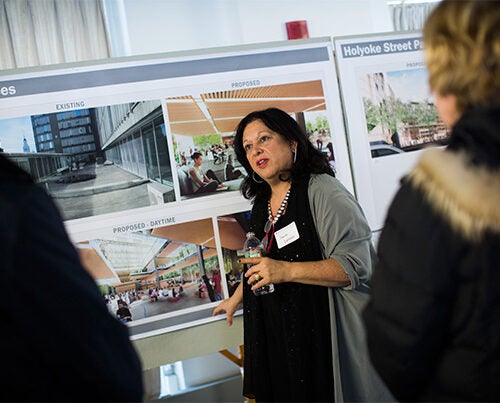 The initial design plans for the Richard A. and Susan F. Smith Campus Center were unveiled at two open houses, with at least two more scheduled for Feb. 2 and 4. Tanya Iatridis (center) was on hand to answer questions and solicit feedback on the proposed designs.